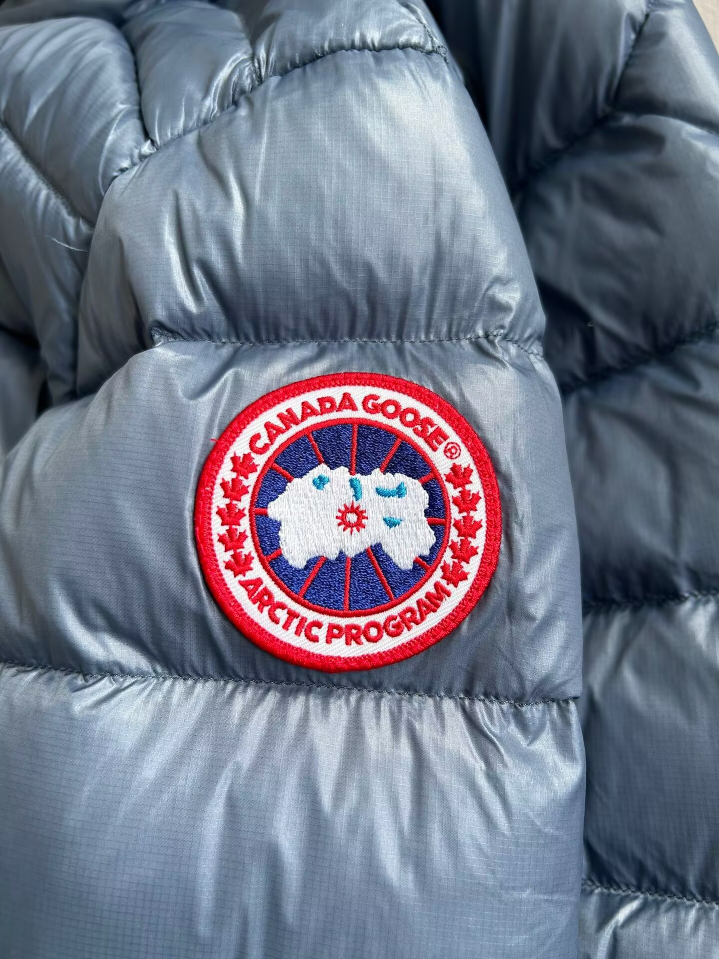Can*a Go*e coat-260